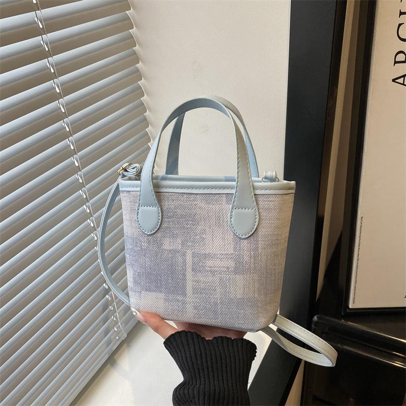 New Korean version of highvalue bucket bag women's new simple commuting handbag casual bag