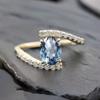 Oval Cut Blue Topaz Ring, Yellow Gold Engagement Ring with Diamond Accents, Unique Split Shank Bridal Jewelry for Women