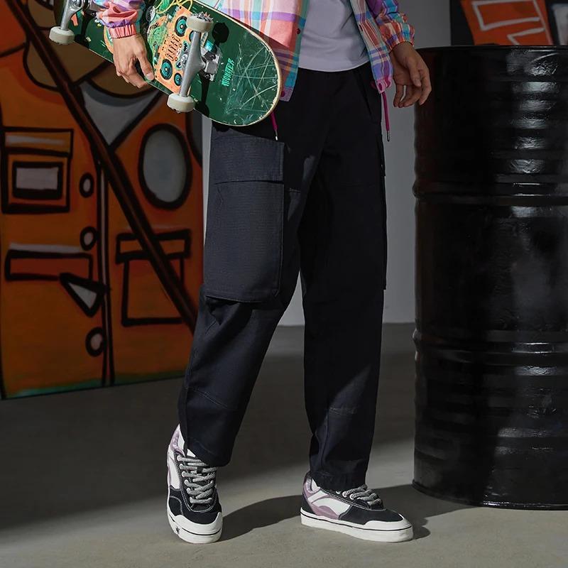 Li Ning Skateboard Series однотонные прямые повседневные длинные брюки мужские низы черного цвета AKXR445-2