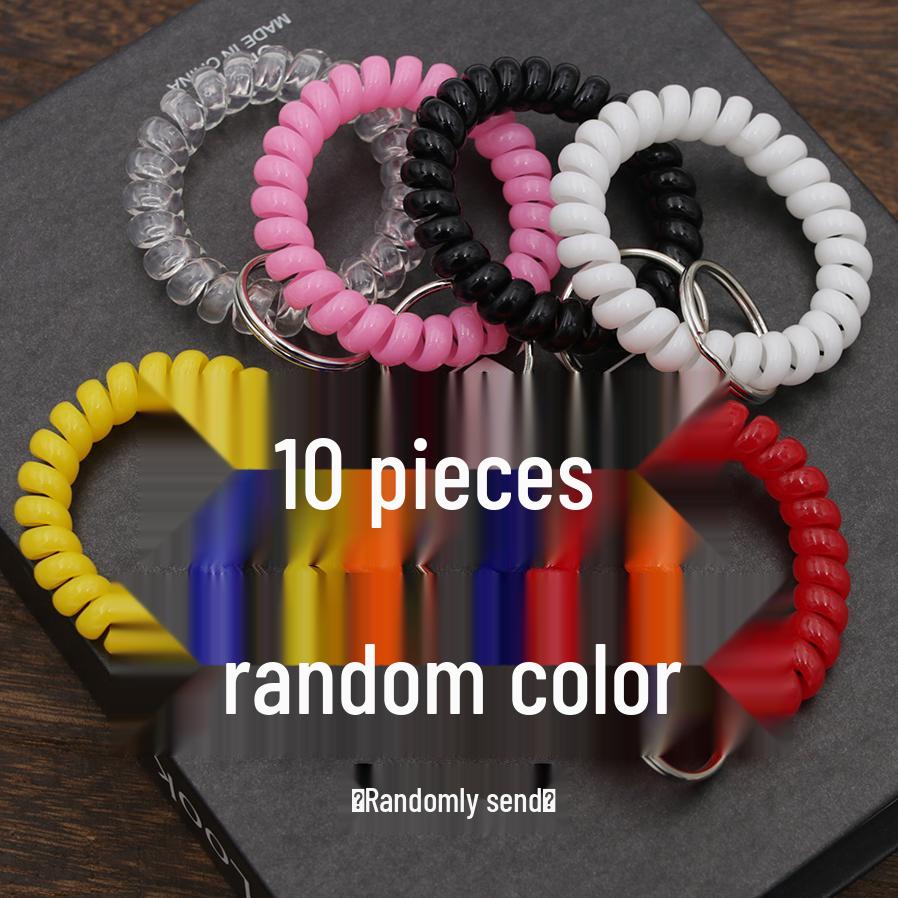 Минималистичный браслет-брелок и резинка для волос в виде пружинного механизма