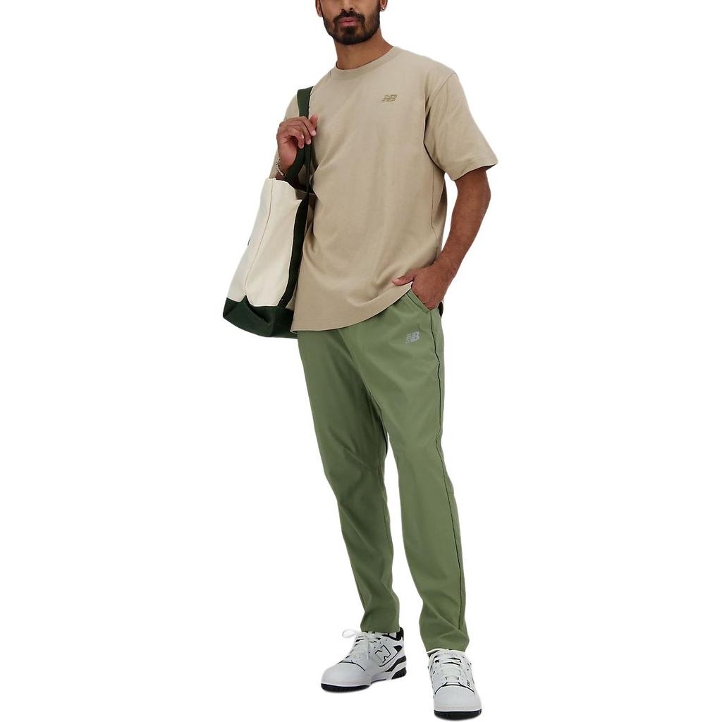 Мужские брюки New Balance AC Tapered Pant 29' Повседневные брюки Мужские Оливково-зеленые