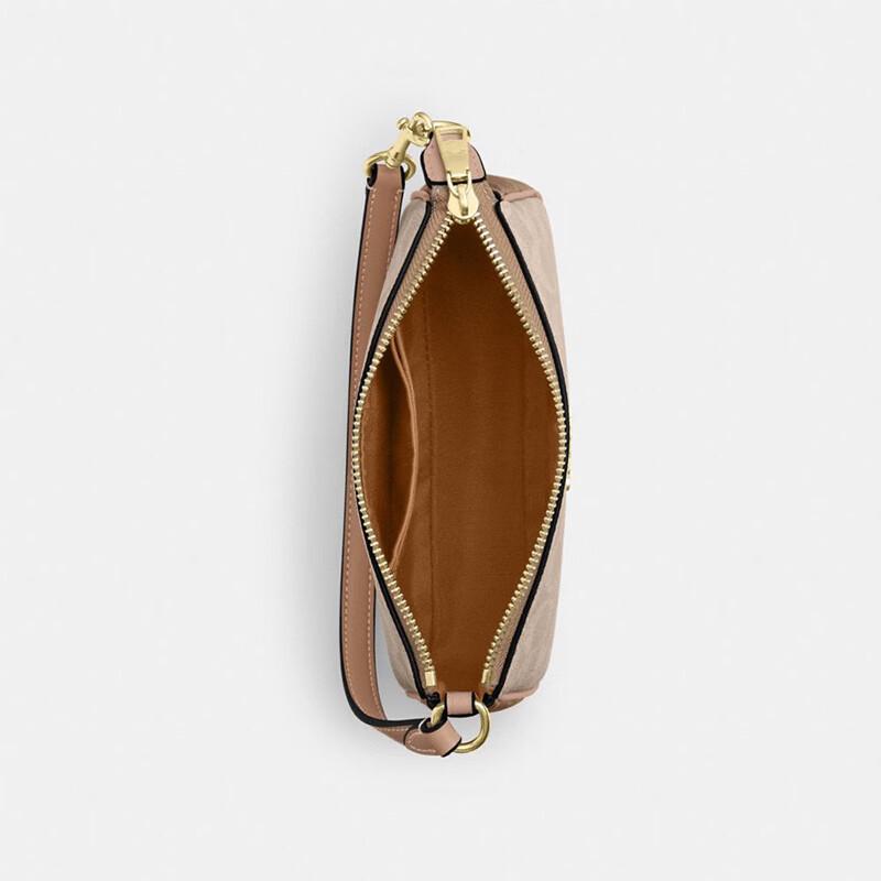 Маленькая сумка на плечо Coach Nolita 19 из канвы с signature-принтом