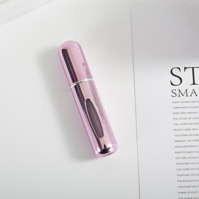 Compact 5ml Self-Pump Spray Perfume Bottle with Aluminum Press Design