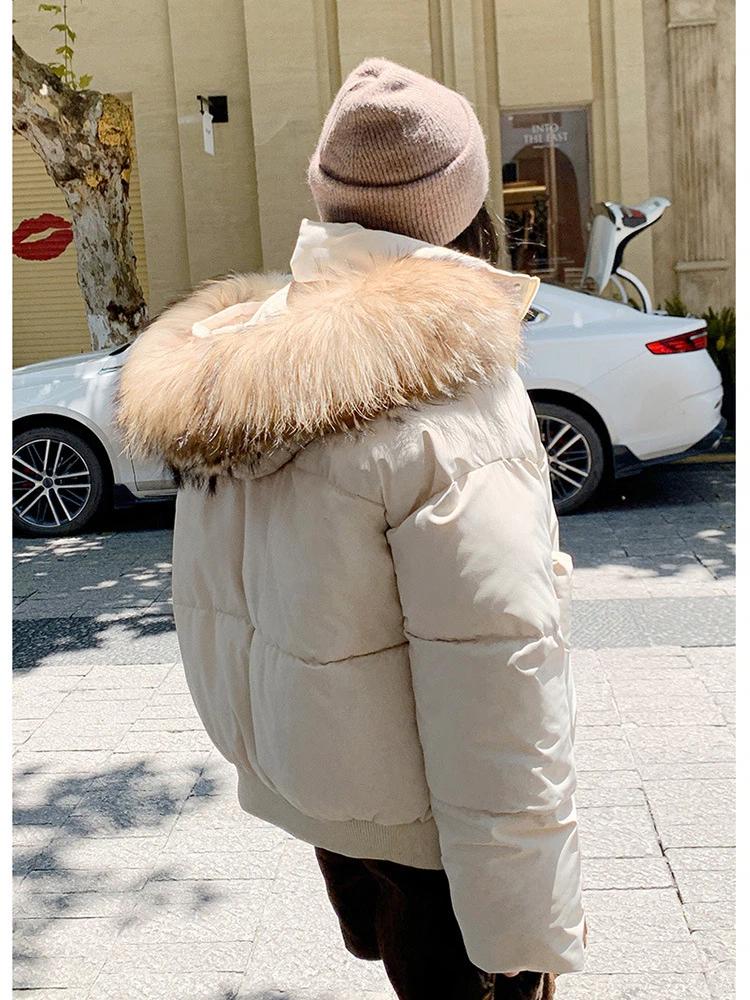 Женская короткая ветрозащитная теплая зимняя куртка с капюшоном из большого меха и рукавами реглан