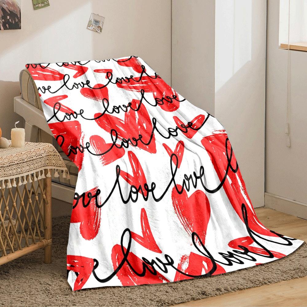Red hand-drawn hearts and arrows paired with cursive black "love" text. for all seasons blanket lunch break throw gift