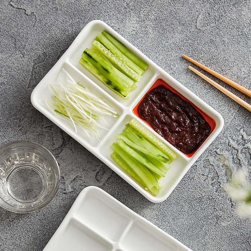 White rectangular multi-compartment ceramic seasoning compartments plate, dipping sauce, side dishes, barbecue sauce dish