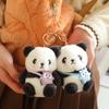 Cartoon Panda Plush Keychain: Cute Soft Backpack Decoration and Scenic Spot Gift for Women.