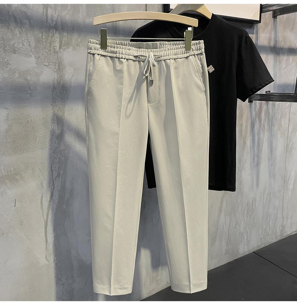 2024 Мужские повседневные брюки с эластичной талией в корейском стиле с девятью точками — ретро-тренд в британском стиле без утюга