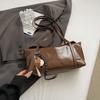 Glossy soft leather niche single shoulder underarm bag women's 2026 new Korean fashion handbag casual commuter bag