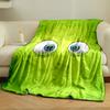 Two large, cartoonish eyes on a bright green background. for all seasons blanket lunch break throw gift
