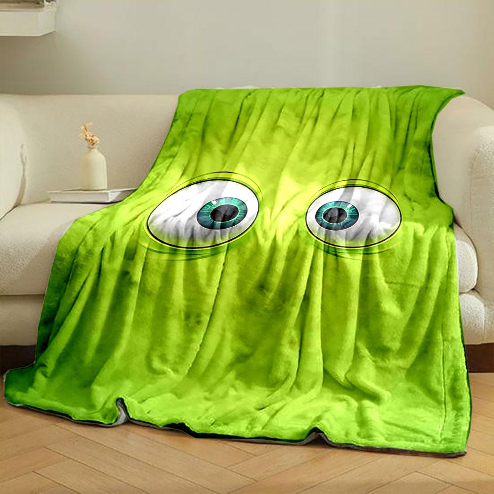 Two large, cartoonish eyes on a bright green background. for all seasons blanket lunch break throw gift