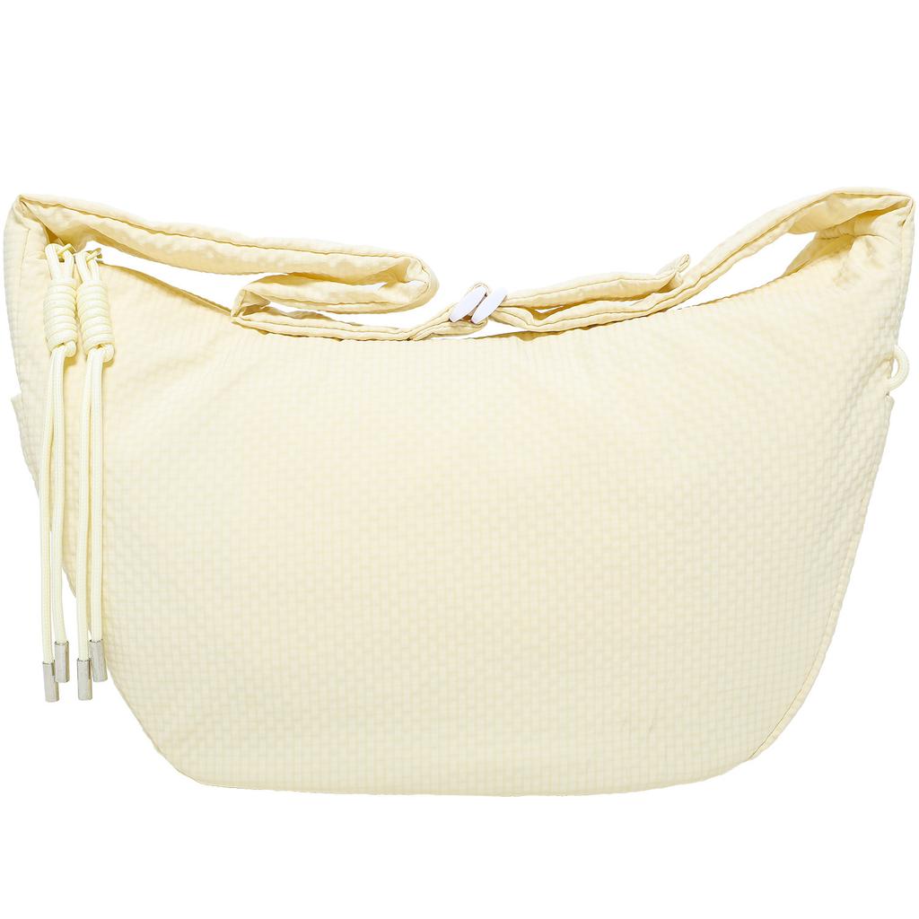 Эта сумка кроссбоди представляет собой простую, но вместительную сумку-пельмень и универсальную сумку-тоут для поездок.
