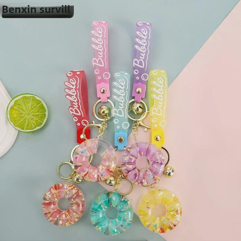 Luminous Oil-Filled Donut Quicksand Keychain: Exquisite Car Pendant & Bag Accessory, Ideal for Gifts.