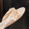 Корейская версия элегантных крутых тапочек в сказочном стиле 2025 новая носка мягкая подошва туфли с бантом плоские пляжные с открытым носком крутые