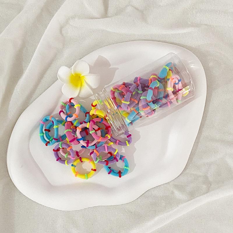 "Colorful Bamboo Ring Hair Ties for Kids - High Elasticity, Gentle On Hair"