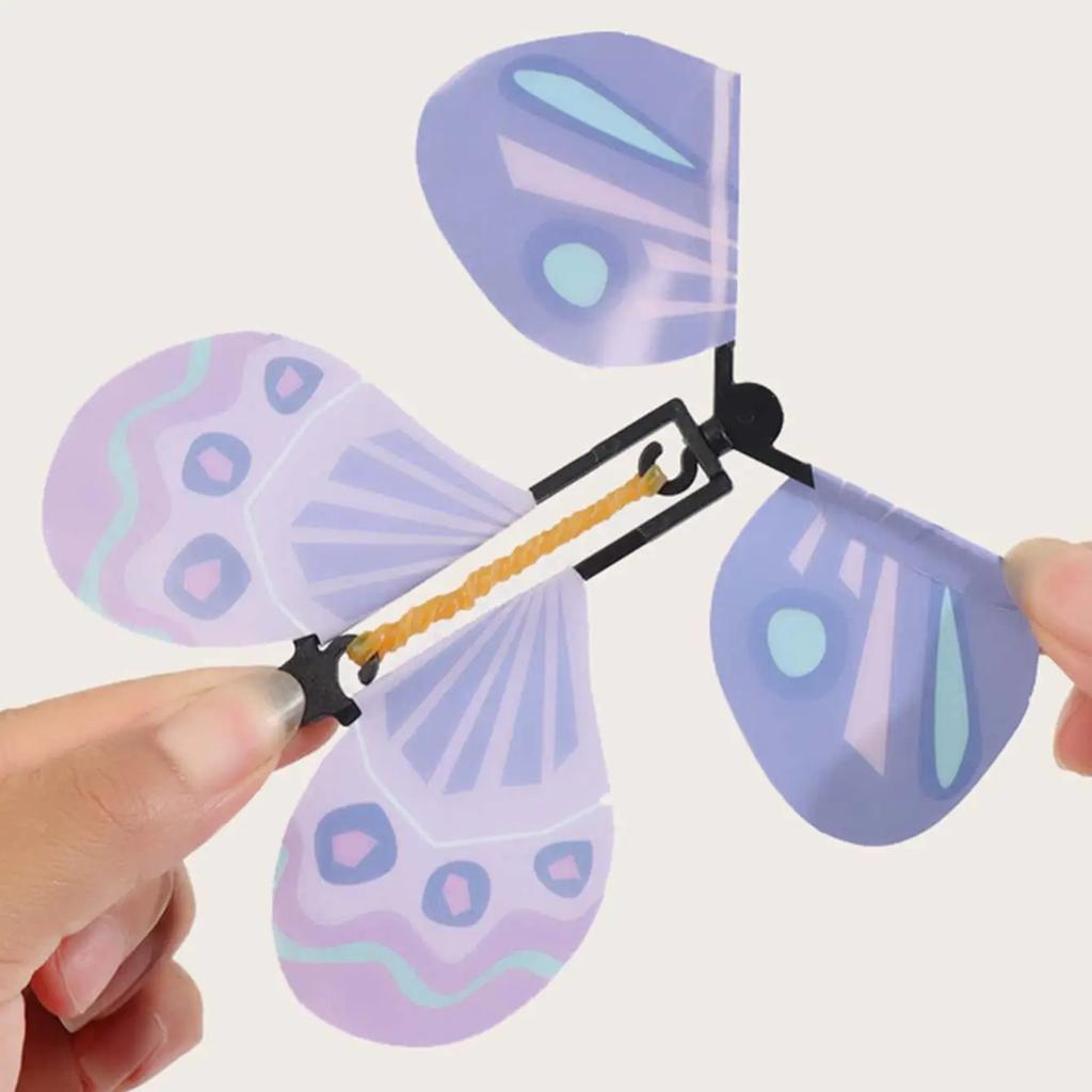 1PC Magic Flying Butterflies Wind Up Toy In The Sky Bookmark Greeting Cards Rubber Band Powered Kids Magic Props Surpris Gift