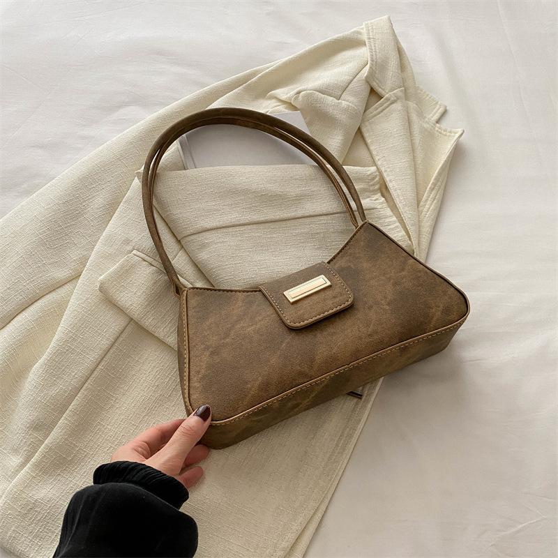 Korean Version of Women's Simple Commuting Women's Bag New Fashion Casual Bag Summer Hand-heeled Shoulder Armpit Crescent Bag