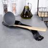 Black ladle and spoon stand