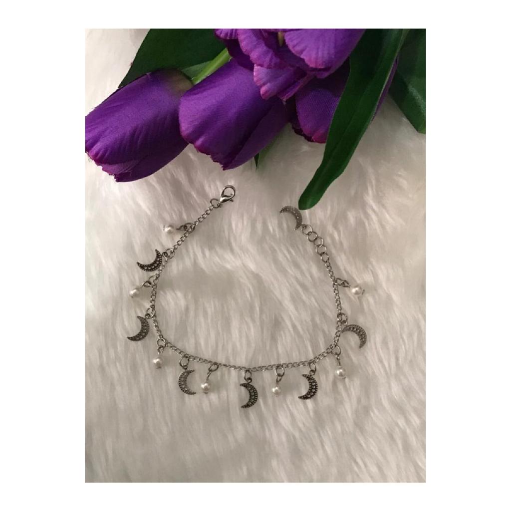 Женский браслет серого цвета со звездой