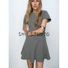 Spring New Women Clothes Stitching Decorative Round Neck Short Sleeve A- Line Hem Mini Dress 2121023