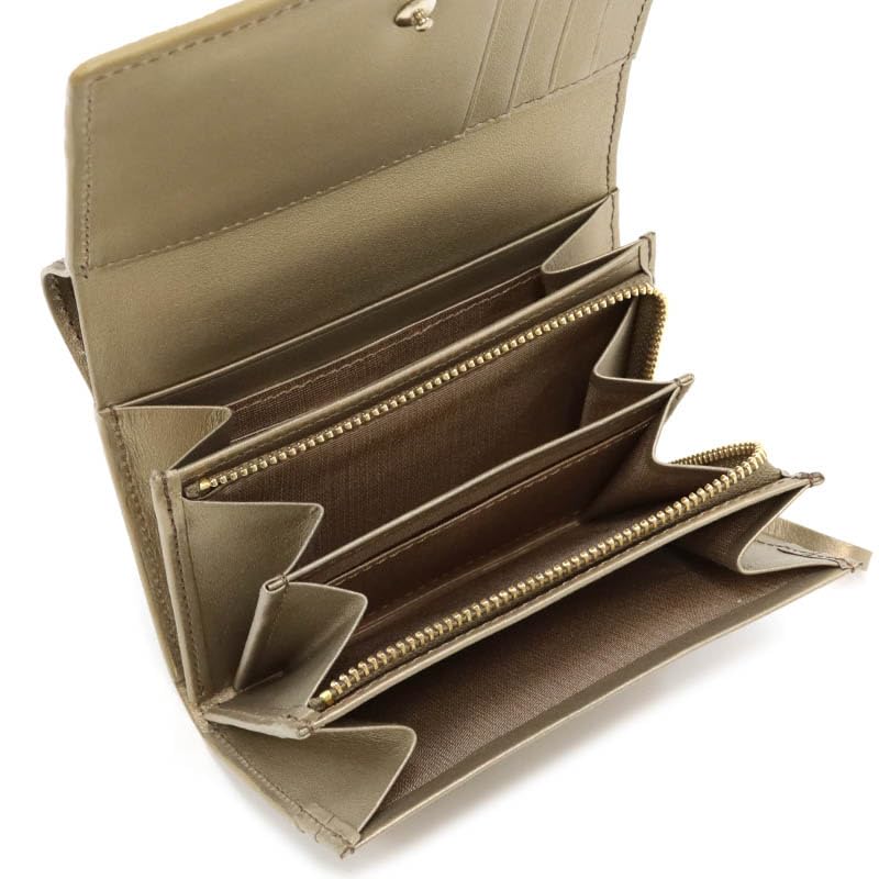 Кошелек Nina Ricci Atre Nouveau Золотой Двустворчатый Кошелек 85-8202 Женский