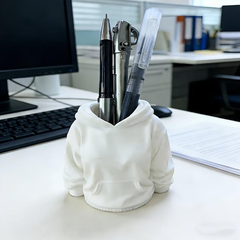 1PC Creative hooded sweater pen holder! It can hold pens and stationery, and it is placed on the desk as both a storage bucket and an ornament!