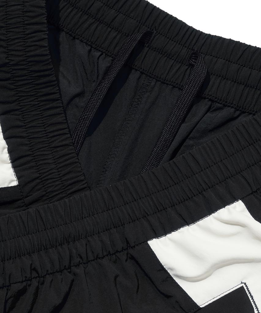 Reebok Теплые тренировочные брюки Heritage 2-Way - Черный