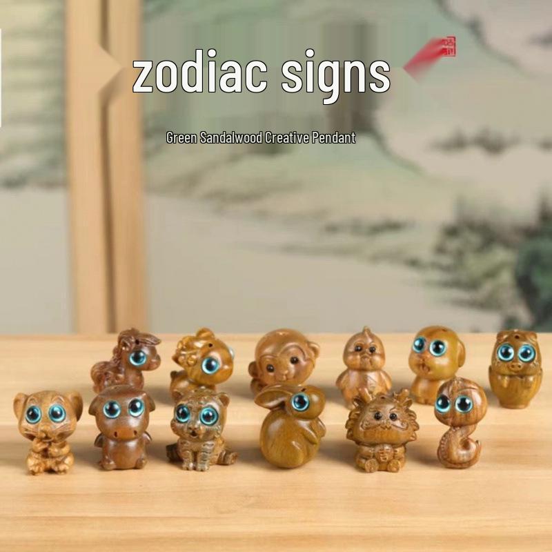 Twelve Zodiac Animal Charms Green Sandalwood Set: Rat, Ox, Tiger, Rabbit, Dragon, Snake, Horse, Sheep, Monkey, Rooster, Dog, Pig.
