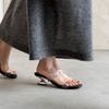 Niche transparent slippers women's summer outer wear 2025 new wedge heel sandals personalized special-shaped heel with high-heeled slippers