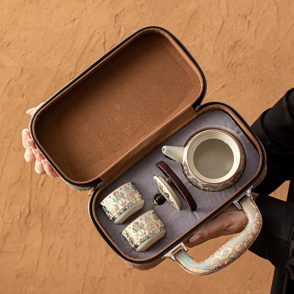 Dunhuang merchandise gold and silver wrong cover bowl two cups travel tea set embroidery bag complete set portable gift box business souvenir