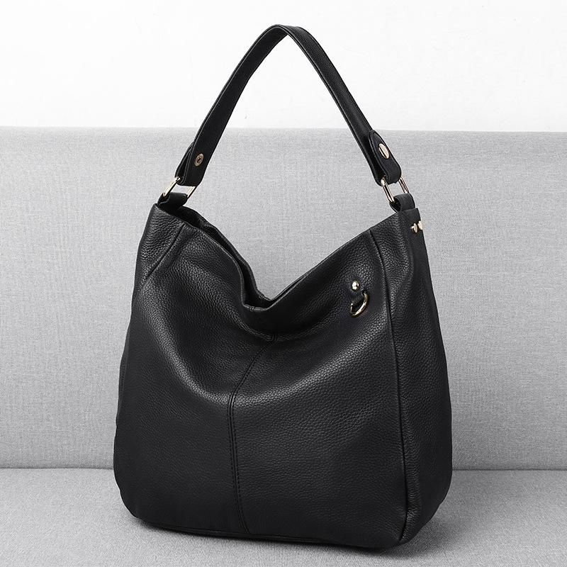 Первый слой коровьей кожи от Feiya — простой и модный, а вместительная сумка-ведро выполнена из мягкой кожи с одним плечом и сумкой через плечо.