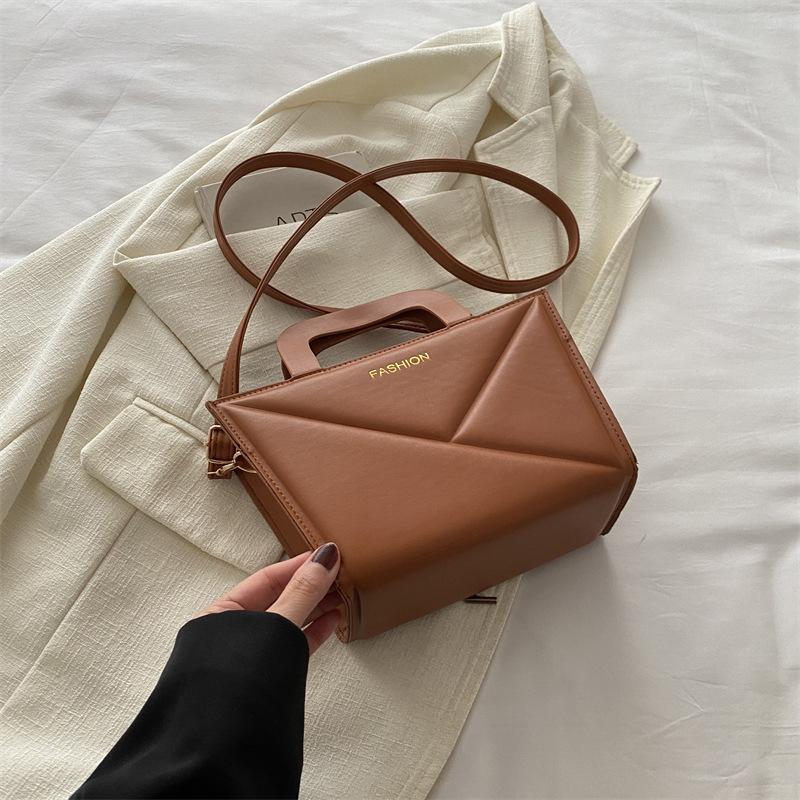 Высококачественная модная однотонная большая вместительная новая весенняя простая и модная ручная сумка через плечо небольшого размера