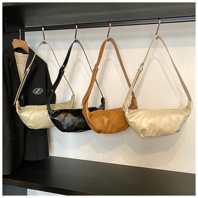 Сумка большой вместимости женская универсальная 2025 новая высококлассный нишевый дизайн широкополосная сумка-мессенджер повседневная сумка-пельмень