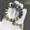 Green Bodhi Root & Ivory Nut Mantra Bracelet with Awakening Lion Charm - Unisex