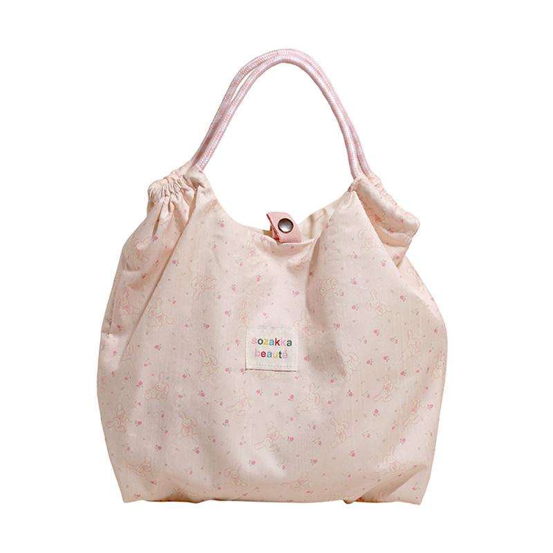 2025 printed new large-capacity commuter bag hand bag Korean version shoulder bag female student cute canvas bag