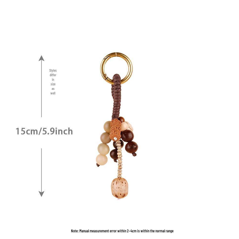 Wish-Fulfilling Bodhi Seed String Bag Charm - Hand-Woven Natural Keychain Ornament with Turquoise.