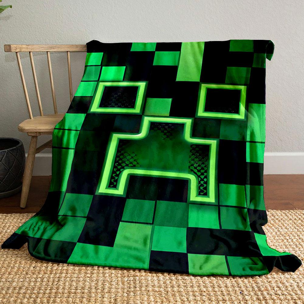 A pixelated green grid with a glowing, abstract face-shaped pattern. for all seasons blanket lunch break throw gift