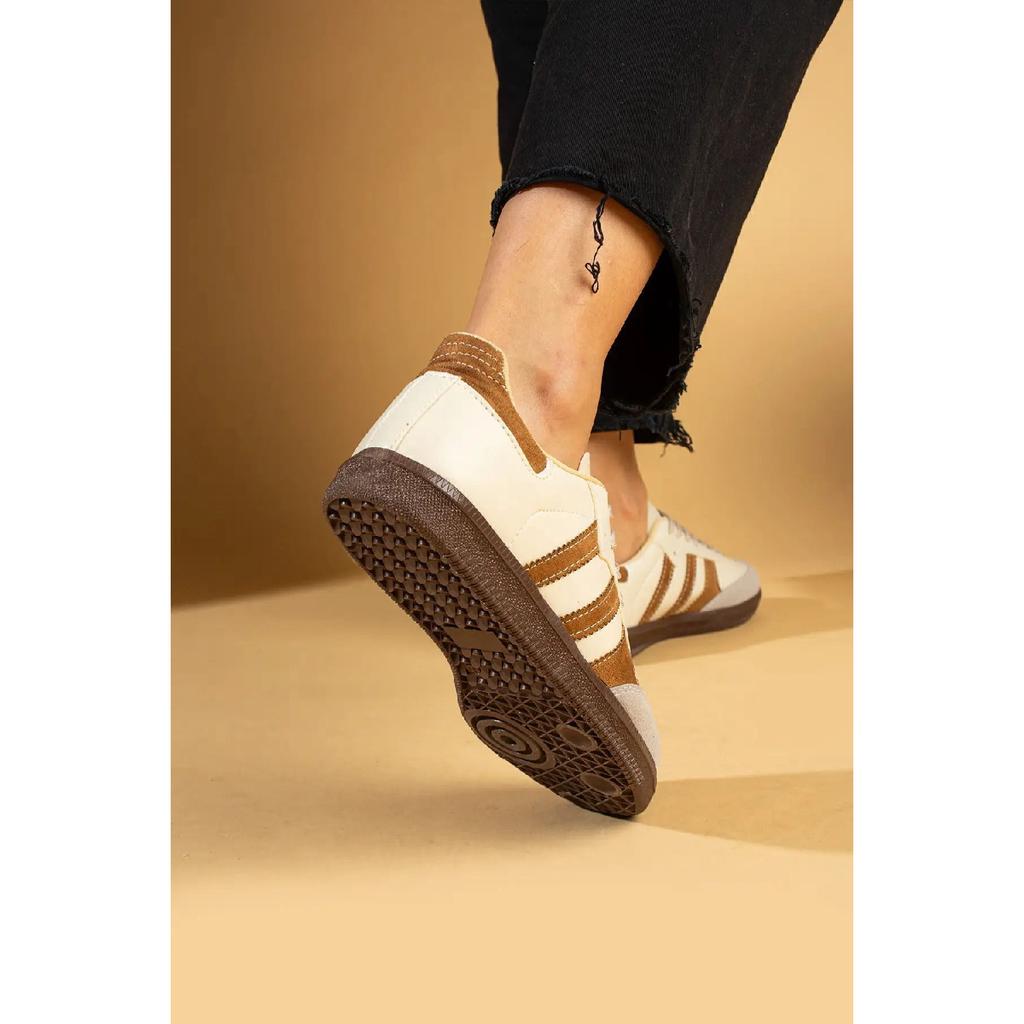 Бело-черные спортивные туфли унисекс в полоску на плоской подошве со шнуровкой