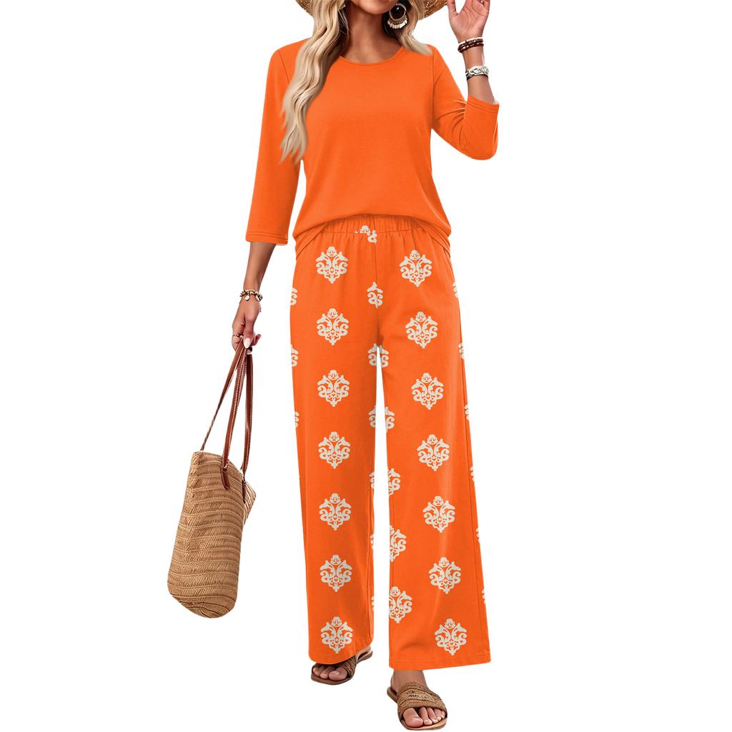 Women's Casual Two Piece Set Round Neck Loose Fit Top with Three Quarter Sleeves and Wide Leg Printed Pants Lounge Wear Set