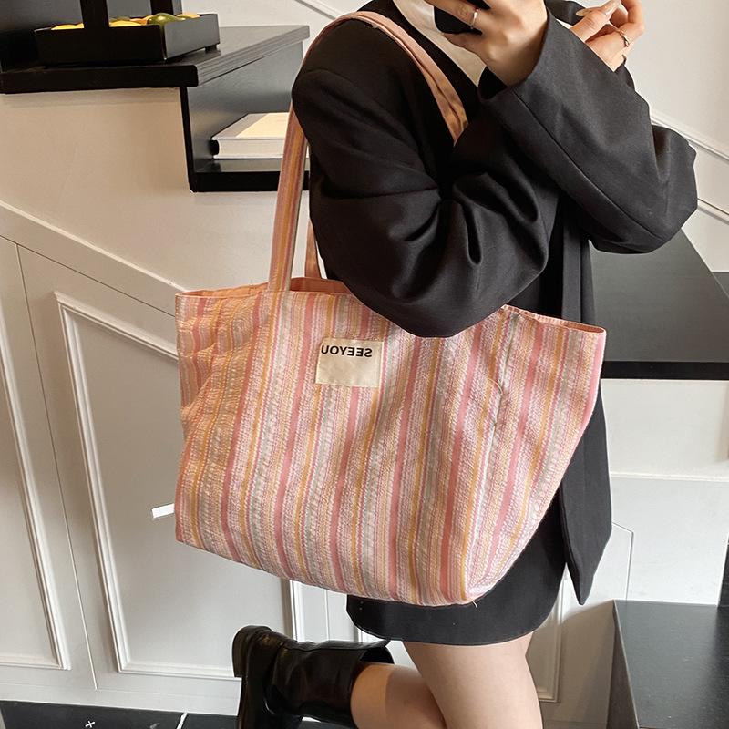 New Canvas Bag Lazy Wind Commuter Versatile Shoulder Bag Niche Casual Letter AB Face Tote Bag