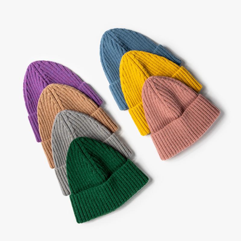 Fashion jacquard knitted hat women's autumn and winter outdoor warmth brimless pointed hat thickened ear protector wool hat tapered hat