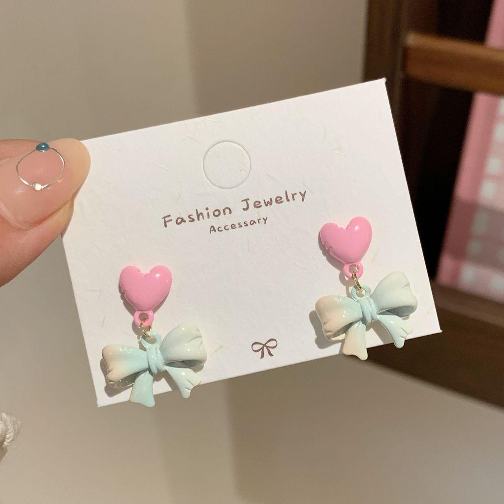 Летние серьги-бантики со звездами серебристого цвета: Сладкий, Изысканный и Уникальный Дизайн для Женщин