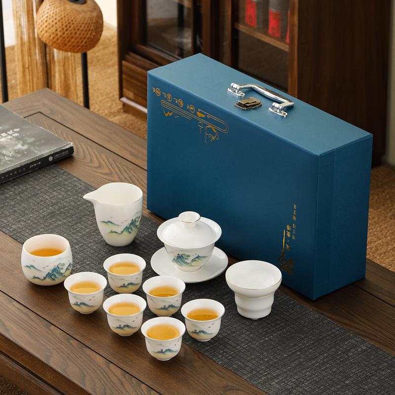 Suet jade porcelain Kung Fu tea tea set, household full set of ceramic tea cup cover bowl Dehua white porcelain tea maker