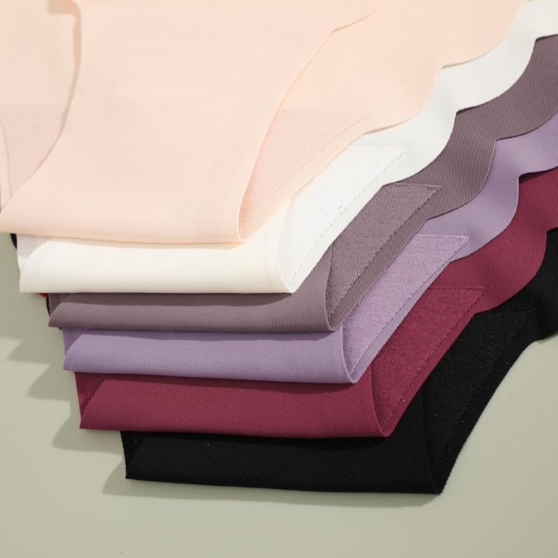 Бесшовные трусики для женщин, модное нижнее белье с волнистыми краями, дышащее белье из ледяного шелка со средней талией