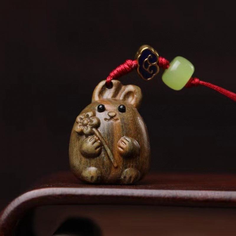 Twelve Zodiac Animal Charms Green Sandalwood Set: Rat, Ox, Tiger, Rabbit, Dragon, Snake, Horse, Sheep, Monkey, Rooster, Dog, Pig.