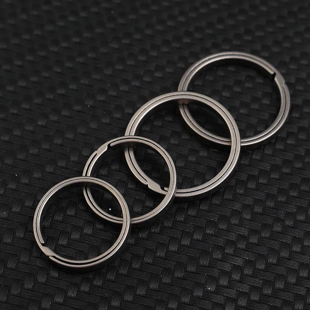 4pcs Metal Key Chain Pendant Hard Side Pushing Rings Creative Titanium Alloy Key Ring Outdoor Tools