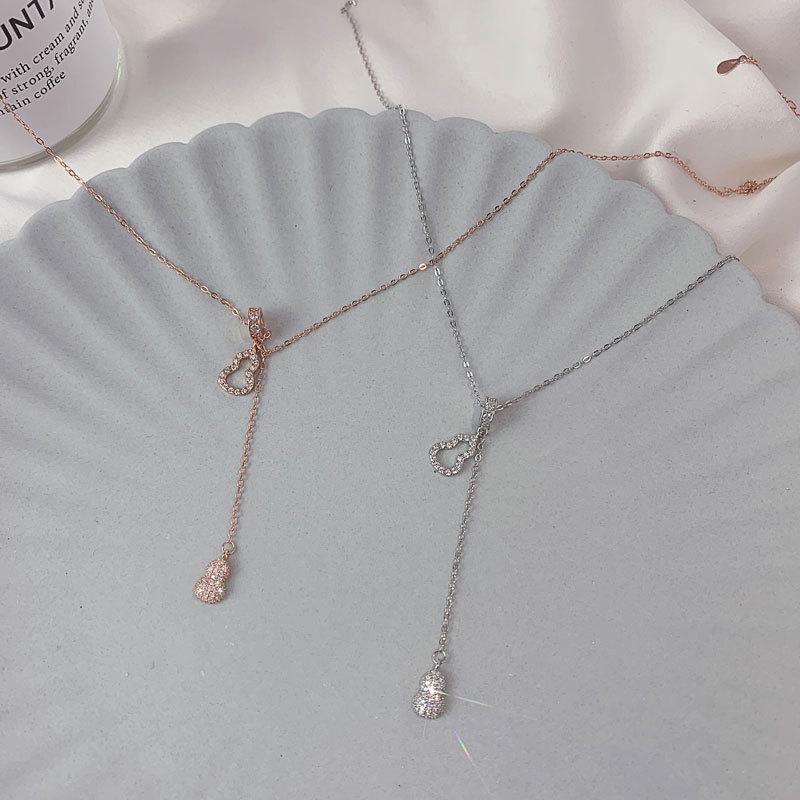 Niche Design Tassel Diamond инкрустированное ожерелье Hoist для женщин Ключичная цепочка для женщин Холодный стиль кулон тренд