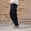 Li Ning Однотонные Штаны-карго Джоггеры с Большими Карманами и Буквой Мужские Черные AKLRF83-1