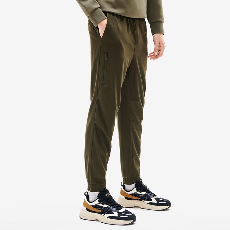 Fila Однотонные тканые зауженные спортивные брюки Мужские брюки Соломенно-зеленый F11M218801FKK