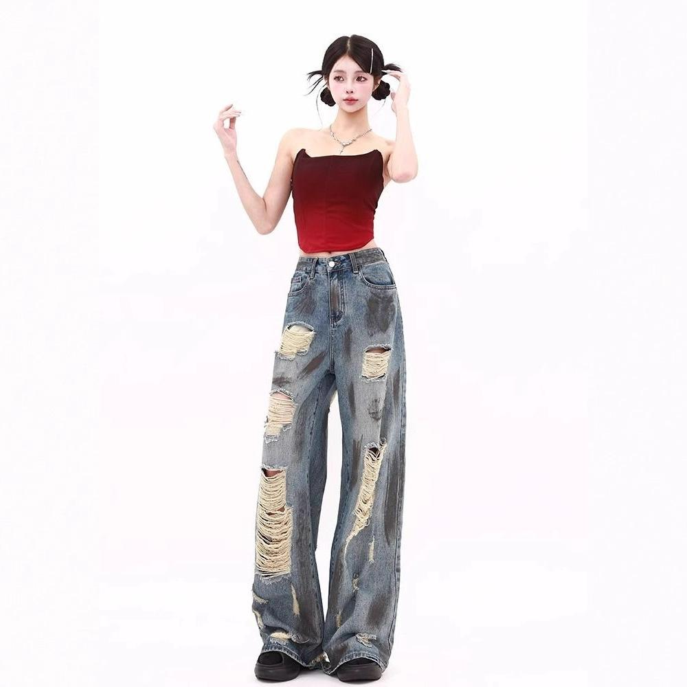 Blue old high street ripped jeans women's European and American autumn design sense versatile lazy wind dirty dyed floor pants